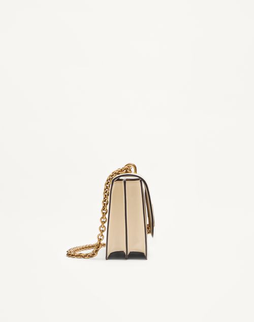 Valentino Garavani - Valentino Garavani Vain Shoulder Bag In Shiny Calfskin - Butter - Woman - Shoulder Bags